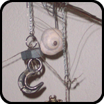 Mobile With Giant Hook, Twigs, Shell, Pewter Lamb, Chimes, Wire, and a Locket Mobile With Giant Hook, Twigs, Shell, Pewter Lamb, Chimes, Wire, and a Locket