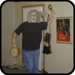 A Cardboard Woman With A Tambourine and Maracas