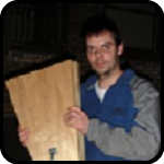 Man Holding Crow Cannon