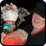 Jo Jo Carrying a Heavy Asian Doll Statue Jo Jo Carrying a Heavy Asian Doll Statue