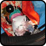 Asian statue in the trunk of our car