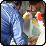 Doug and Kelly moving the Toylet Doug and Kelly moving the Toylet